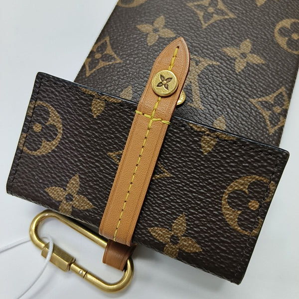 Monogram Coated Canvas Clutch Brown