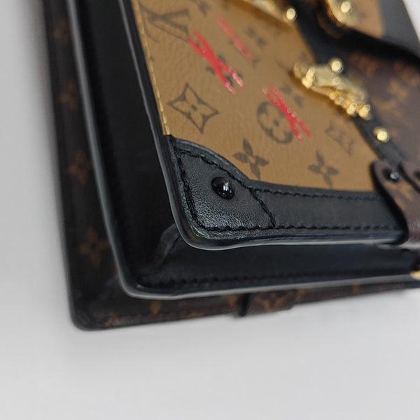 TRUNK Monogram Coated Canvas Brown