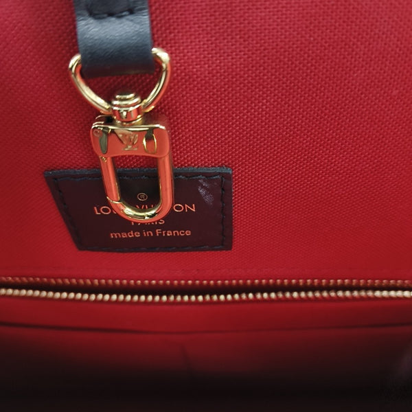 Authenticated pre-owned ONTHEGO GM Monogram Coated Canvas Brown - Tote Bag at Looply