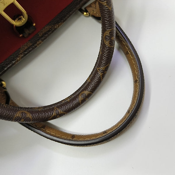 ONTHEGO PM Monogram Coated Canvas Brown
