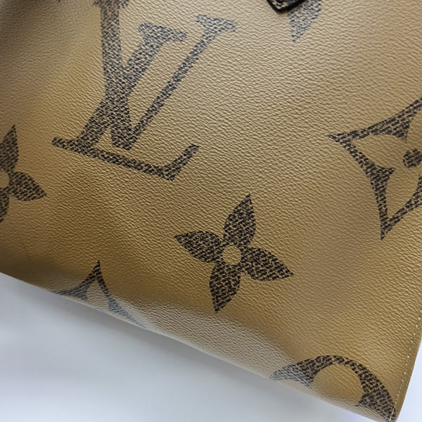 ONTHEGO MM Monogram Coated Canvas Brown