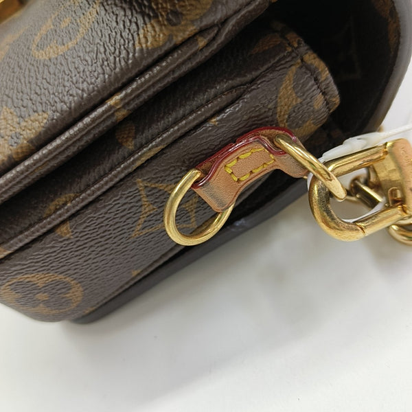 MÉTIS EAST WEST Monogram Coated Canvas Brown