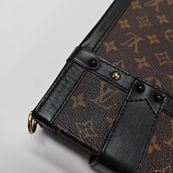 TRUNK Monogram Coated Canvas Brown