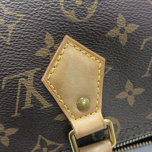 SPEEDY 25 Monogram Coated Canvas Brown