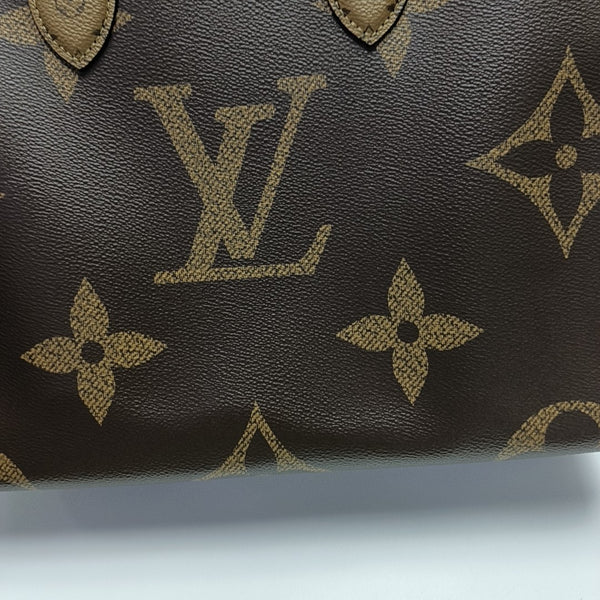 ONTHEGO MM Monogram Coated Canvas Brown
