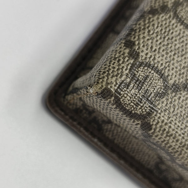 Monogram Coated Canvas Clutch Beige