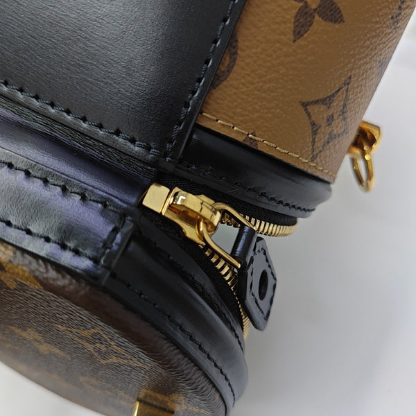 CANNES PM Monogram Coated Canvas Brown