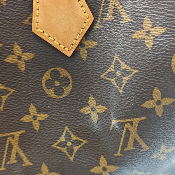 Authenticated pre-owned SPEEDY 25 Monogram Coated Canvas Brown - Top Handle Bag at Looply