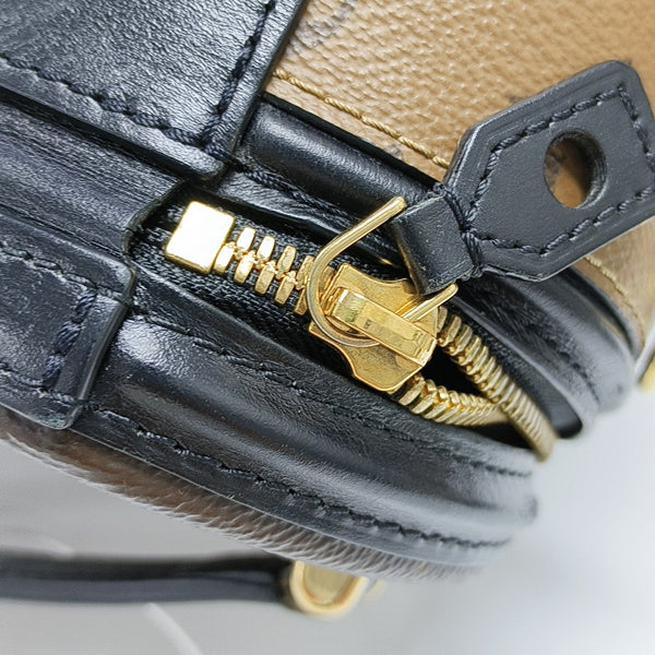 CANNES PM Monogram Coated Canvas Brown