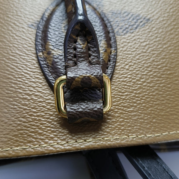ONTHEGO MM Monogram Coated Canvas Brown