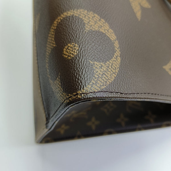 ONTHEGO MM Monogram Coated Canvas Brown