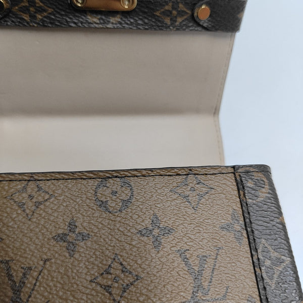 TRUNK Monogram Coated Canvas Brown