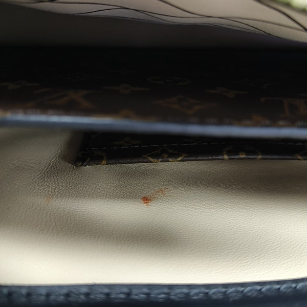 TRUNK Monogram Coated Canvas Brown