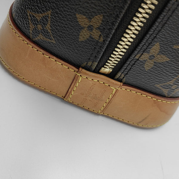 ALMA PM Monogram Coated Canvas Brown