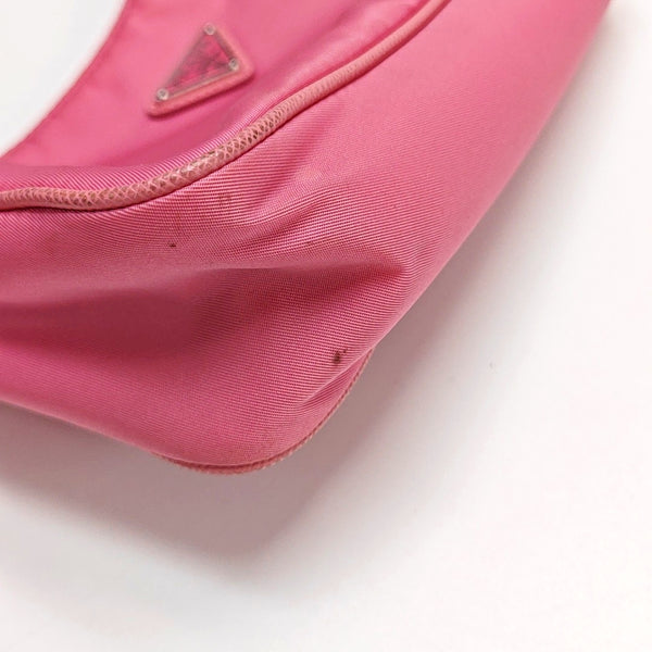 Authenticated pre-owned Re-Edition2005 Mini Nylon Red - Top Handle Bag at Looply