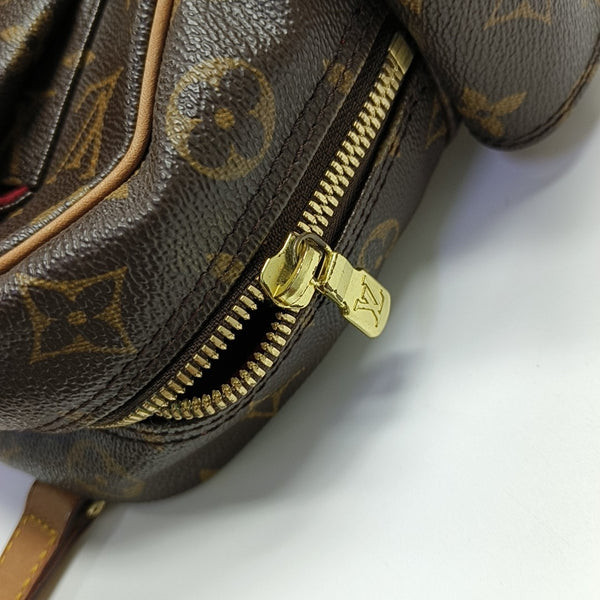 EXCENTRI-CITE Monogram Coated Canvas Brown