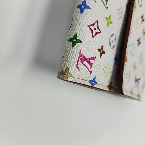 Monedero Monogram en lona revestida blanca
