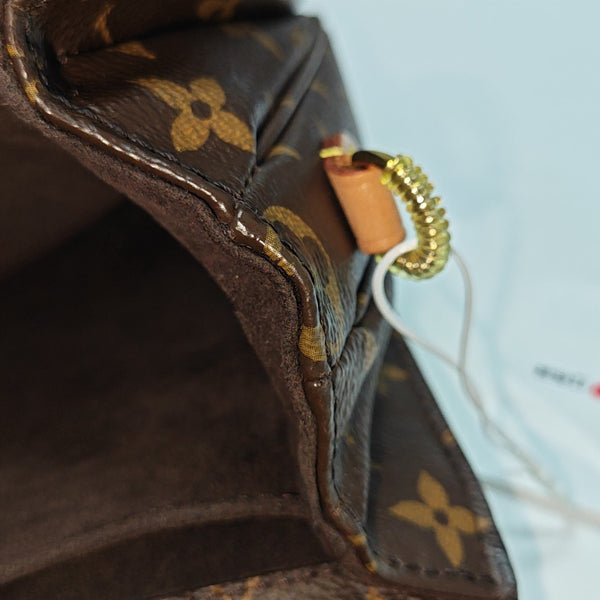 MÉTIS MM Monogram Coated Canvas Brown