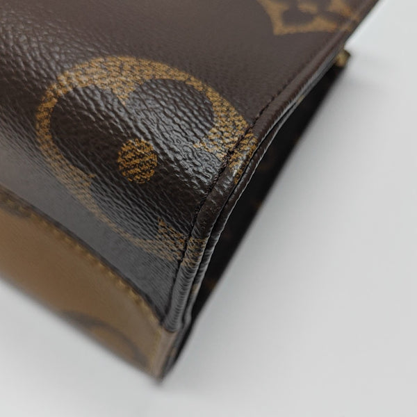 ONTHEGO PM Monogram Coated Canvas Brown