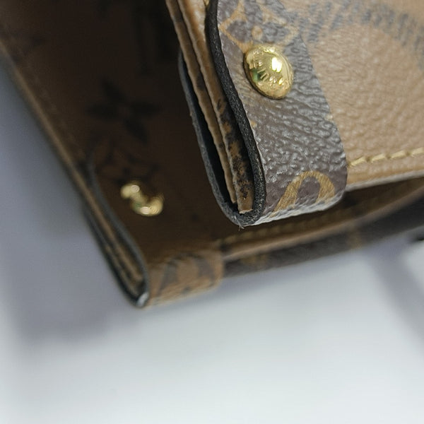 ONTHEGO MM Monogram Coated Canvas Brown