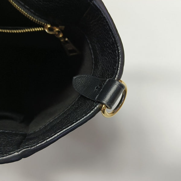 ON MY SIDE PM Monogram Coated Canvas Black