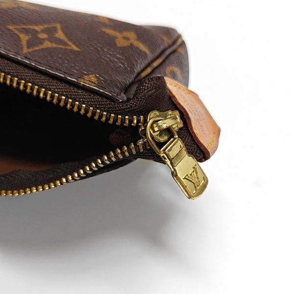 Authenticated pre-owned ACCESSOIRES Mini Monogram Coated Canvas Brown - Top Handle Bag at Looply