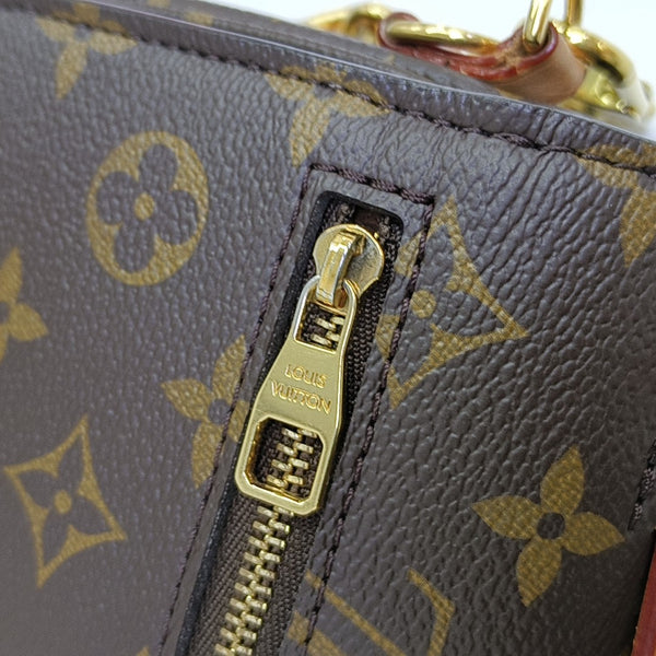 MÉTIS EAST WEST Monogram Coated Canvas Brown