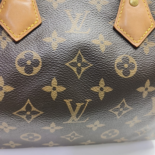 SPEEDY 25 Monogram Coated Canvas Brown