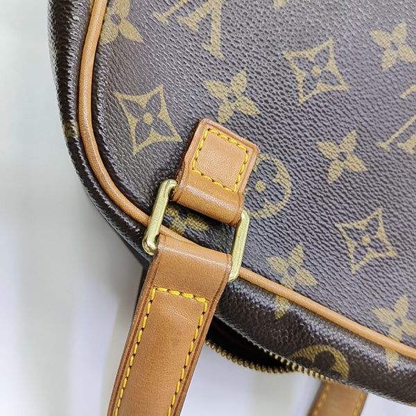 EXCENTRI-CITE Monogram Coated Canvas Brown