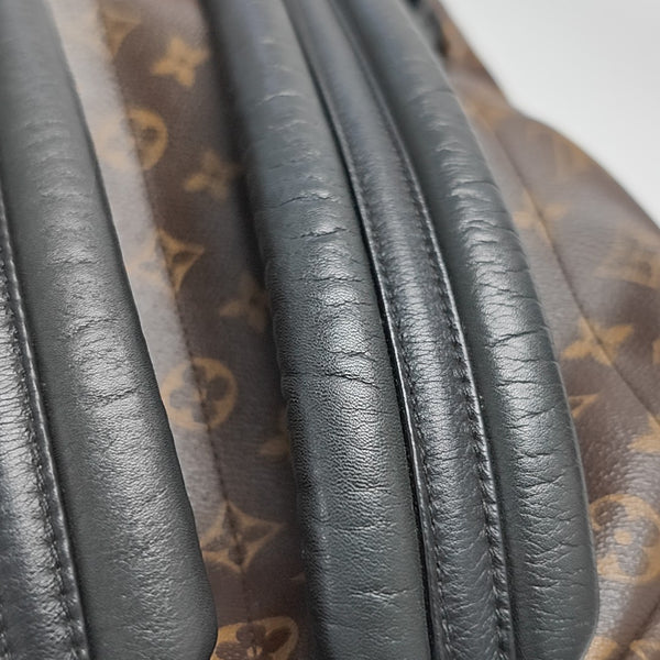 Monogram Coated Canvas Backpack Brown