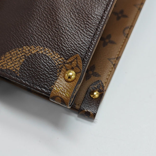 ONTHEGO MM Monogram Coated Canvas Brown