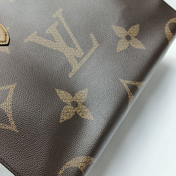 ONTHEGO MM Monogram Coated Canvas Brown