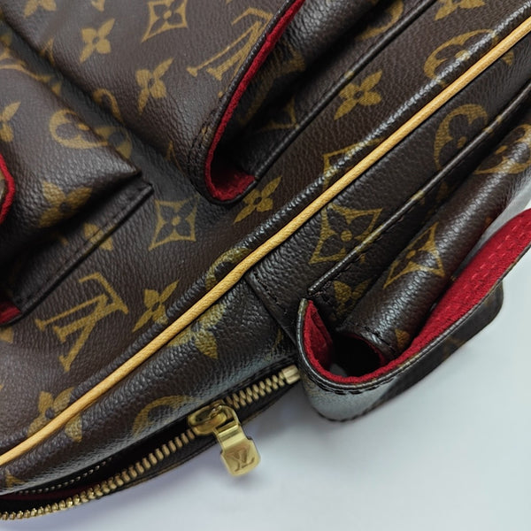 EXCENTRI-CITE Monogram Coated Canvas Brown