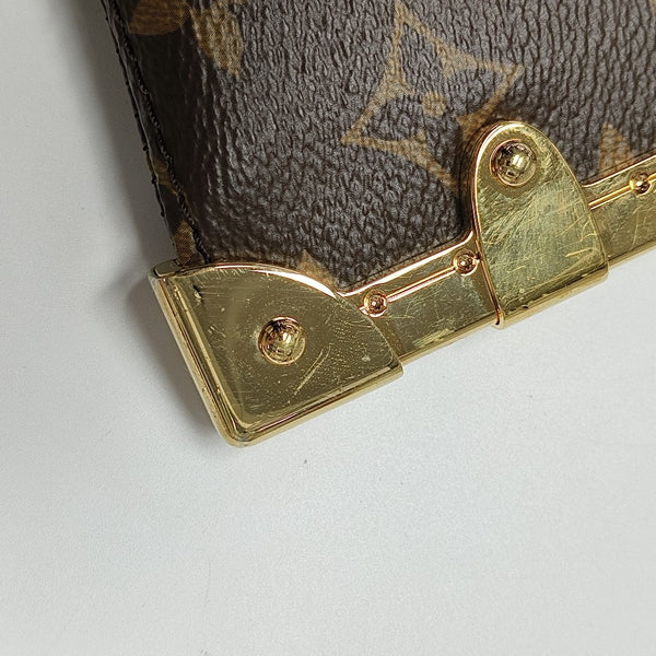 TRUNK Monogram Coated Canvas Brown