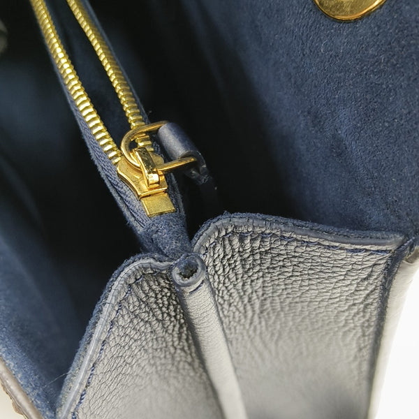 VICTOIRE Monogram Coated Canvas Brown