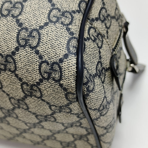 Monogram Coated Canvas Clutch Black