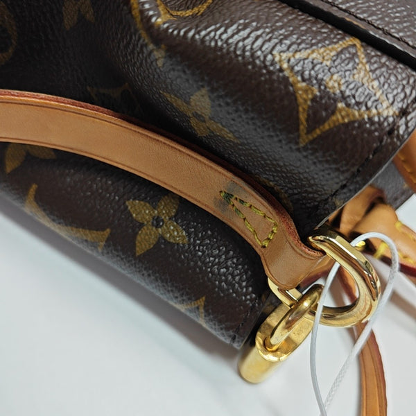 MONTAIGNE Monogram Coated Canvas Brown