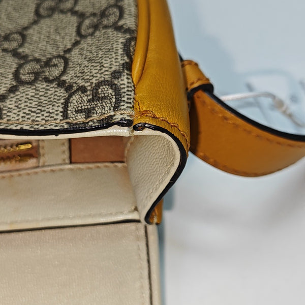 Padlock Small Monogram Coated Canvas Beige