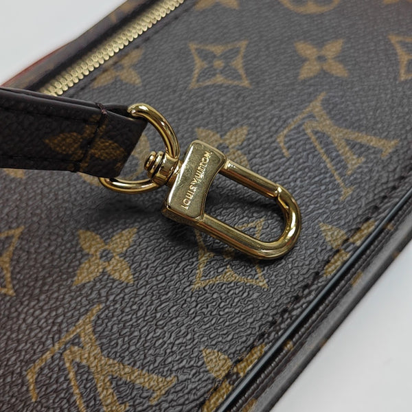 MÉTIS EAST WEST Monogram Coated Canvas Brown