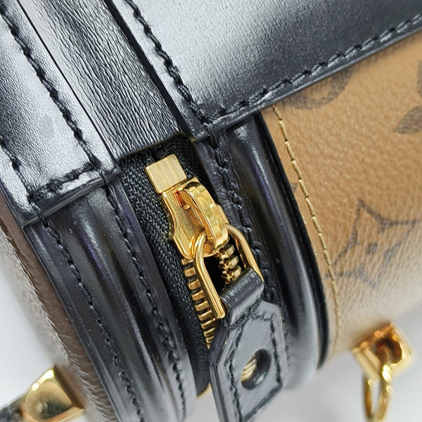 CANNES PM Monogram Coated Canvas Brown