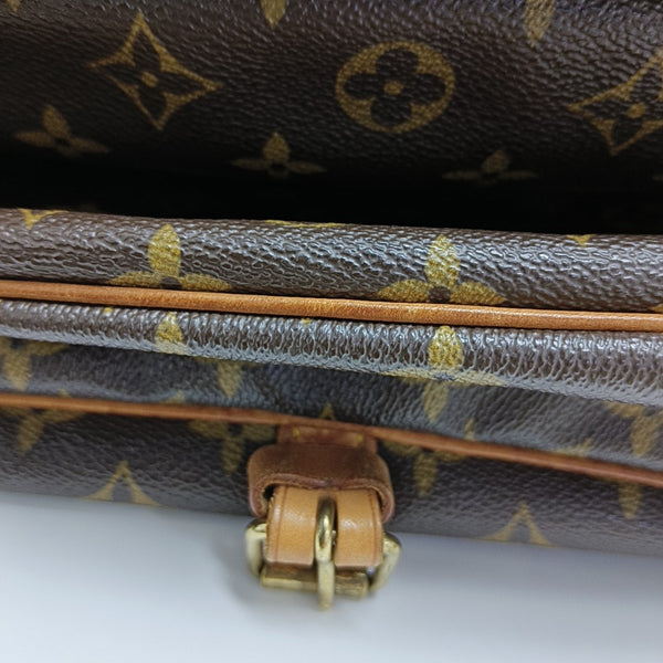 SAUMUR Monogram Coated Canvas Brown