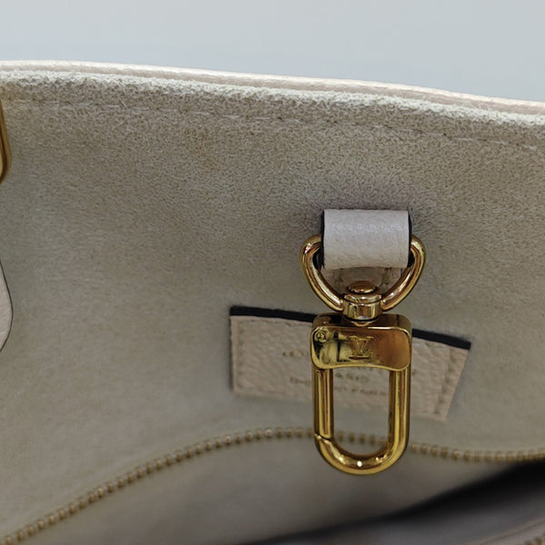 ONTHEGO MM Monogram Calfskin Beige