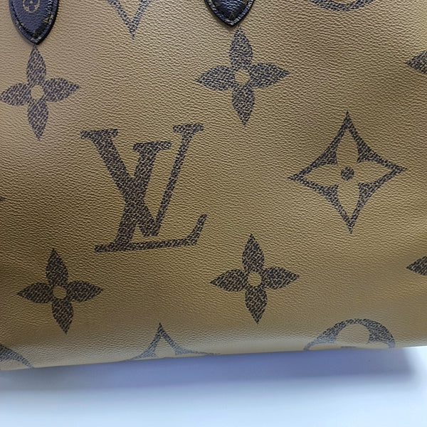 ONTHEGO GM Monogram Coated Canvas Brown