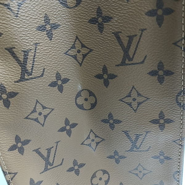 ONTHEGO MM Monogram Coated Canvas Brown