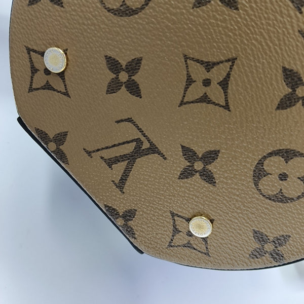 CANNES PM Monogram Coated Canvas Brown