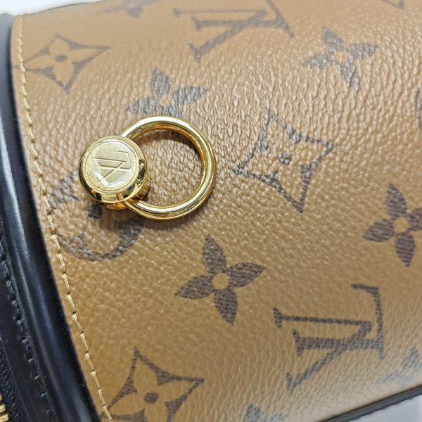 CANNES PM Monogram Coated Canvas Brown