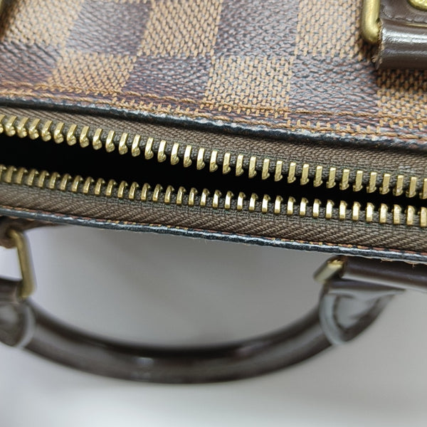 SPEEDY 25 Damier Ebene Coated Canvas Brown