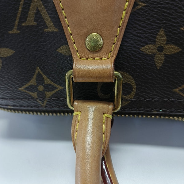 SPEEDY 25 Monogram Coated Canvas Brown