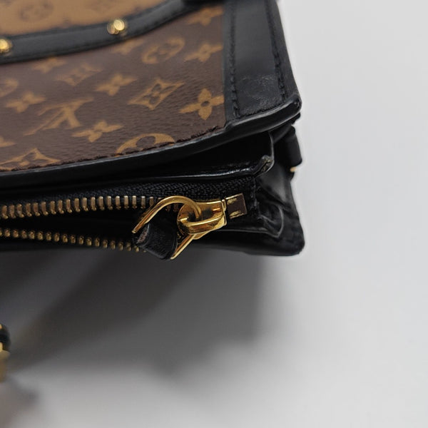 TRUNK Monogram Coated Canvas Brown