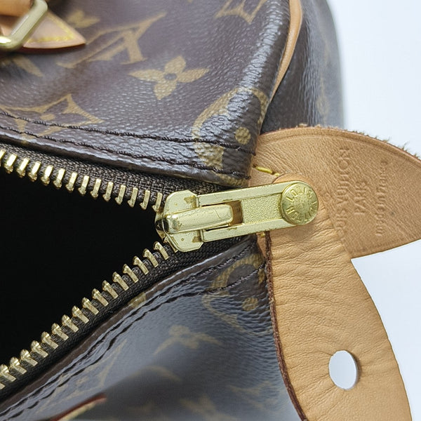 SPEEDY 25 Monogram Coated Canvas Brown